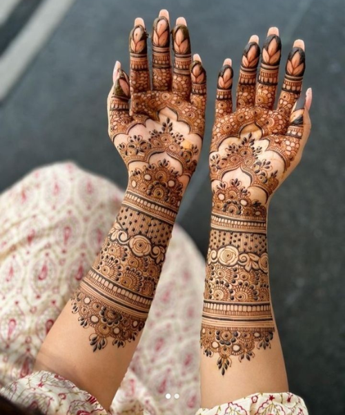 Simple Full Hand Mehndi Design with motifs