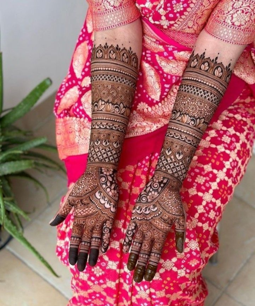 Full hand mehndi design with Indian Motifs