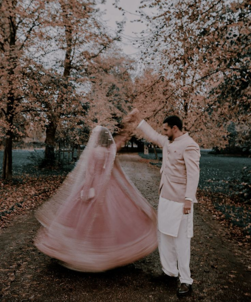 Bride Twirling Pose with Groom
