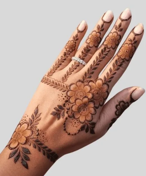 Hand Jewellery inspired flower mehndi design 