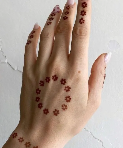 Minimal Small Flower back hand mehndi