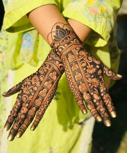 Back hand mehndi design with lotus flowers 