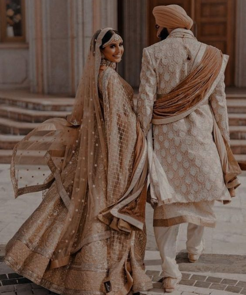 Photo while bride and groom walks