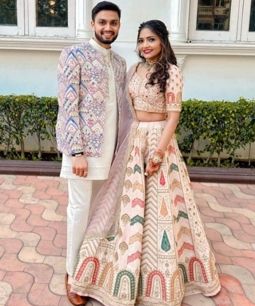 White Coloured Ethnic Jacket with blue and red coloured work