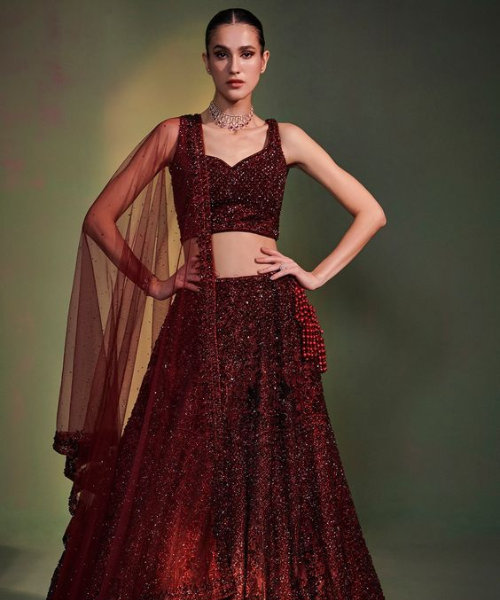 Sparkling maroon lehenga with sleek, minimalistic design