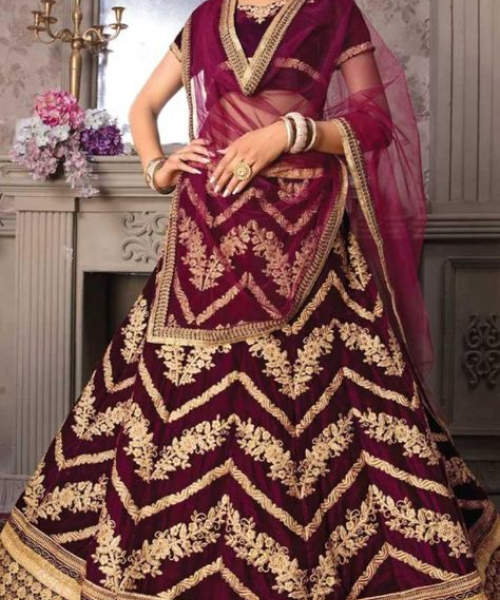 Zigzag gold patterns on maroon, bold and ornate design