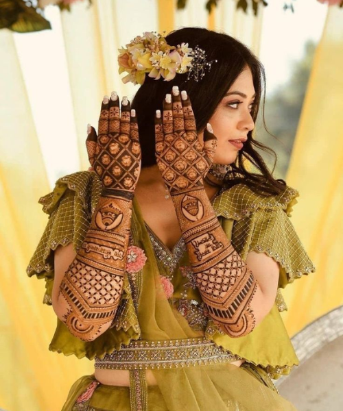 Bride shows her mehndi