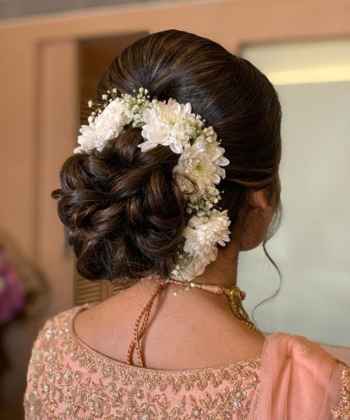 Elegant Twisted Bun with White Florals