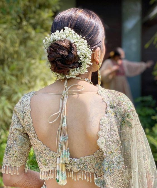 Classic Bridal Bun with Baby's Breath Flower