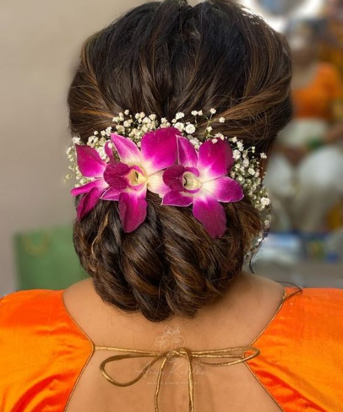 Braided Bun with Orchids and Baby's Breath Flower