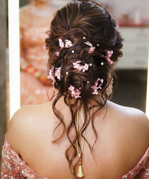 Messy Bridal Bun with Pink Florals and Pearls