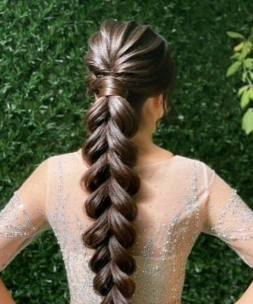 Elegant Bubble Braid with Voluminous Sections for a Sleek Bridal Look