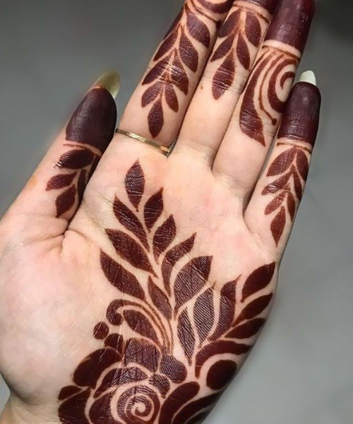 Bold Arabic Mehndi with Leafy and Abstract Patterns