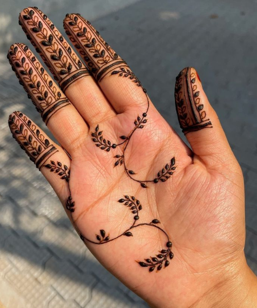 Minimalistic Leaf Mehndi Design with Detailed Finger Patterns and Vines