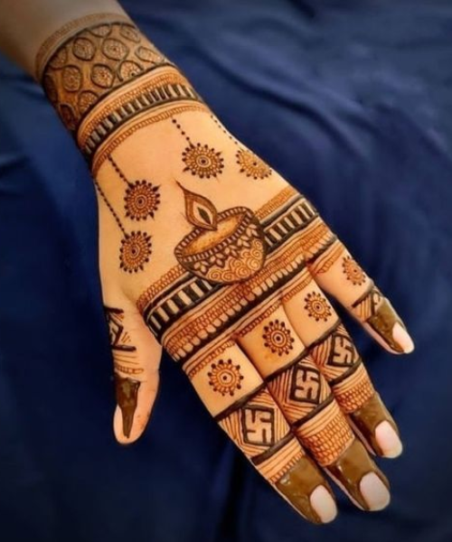 Back Hand Mehndi with Diya and Hanging Lights