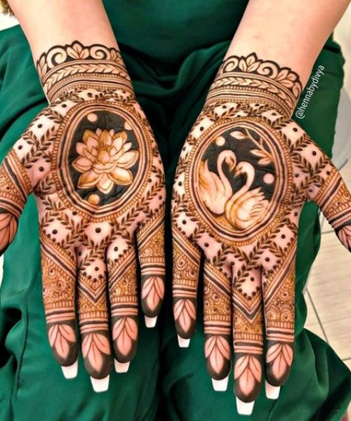 Mehndi design with swans and lotus motifs