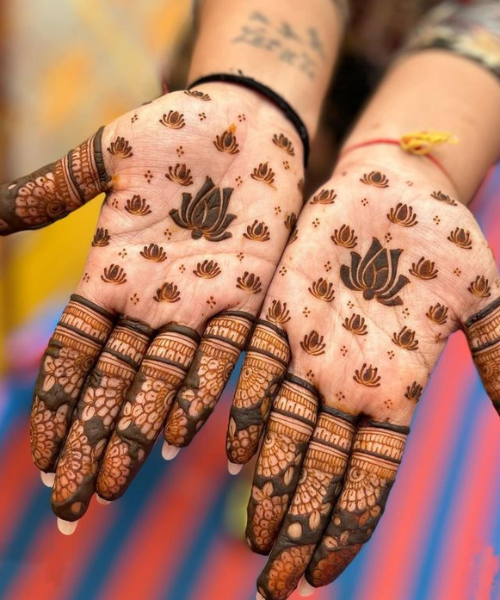 Mehndi design with small lotus motifs