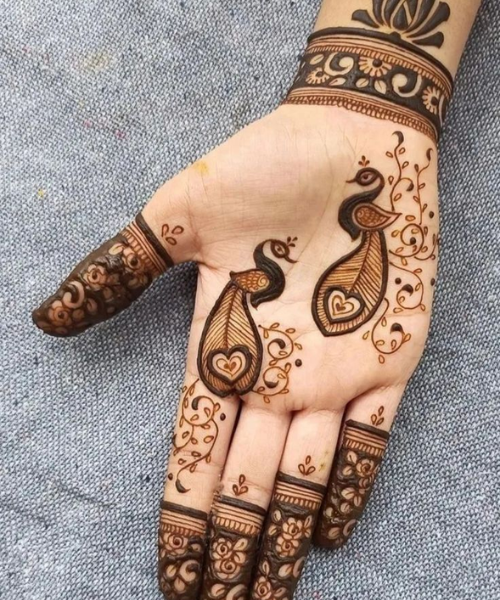 Mehndi Design with Peacock Motifs