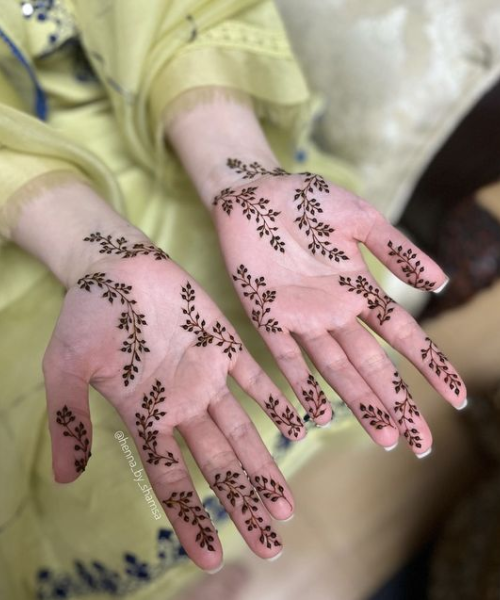 Minimal mehndi design with vines and leaves