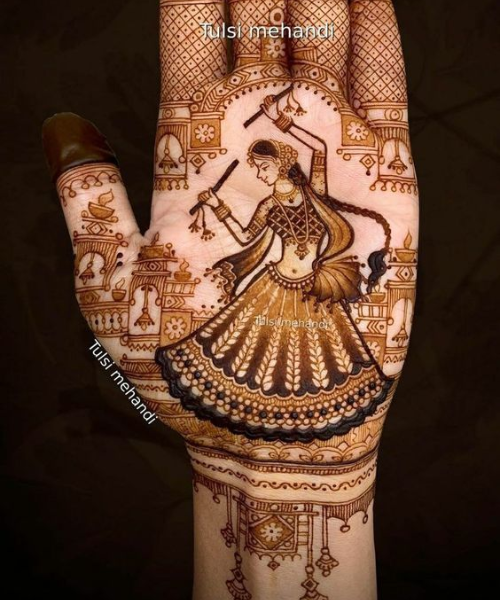 Mehndi Design with woman doing garba