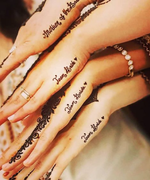 Simple “Team Bride” text mehndi