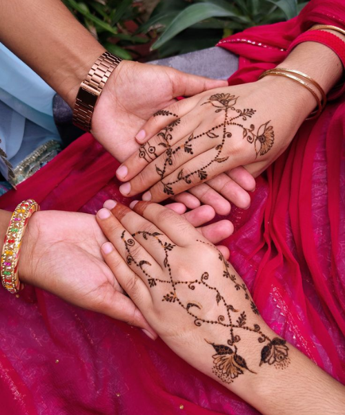 Elegant floral vine mehndi with simple leafy accents