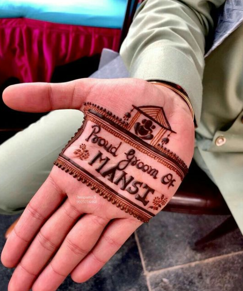 "Proud Groom of Bride" written on hand