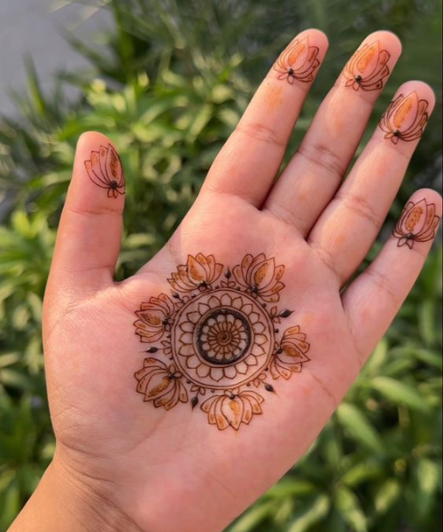 Minimal mehndi with lotus and fine work