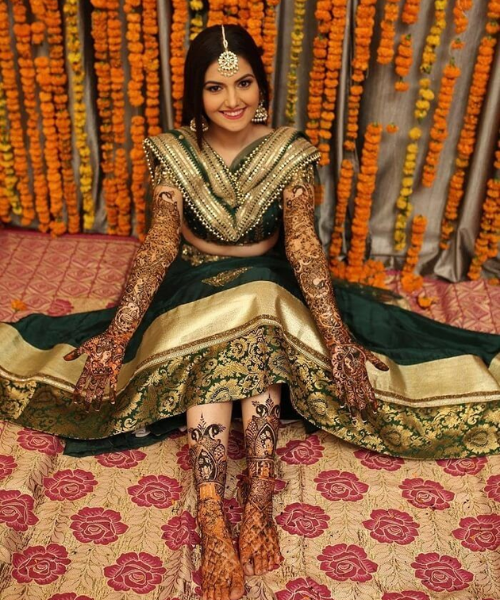 Clicking while getting mehndi