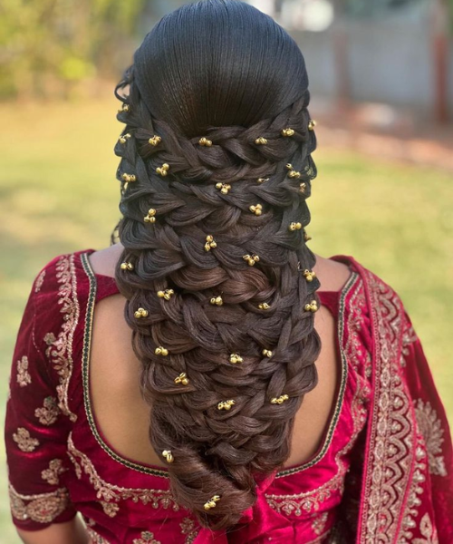 Intricate Braided Bridal Hairstyle with Gold Beads