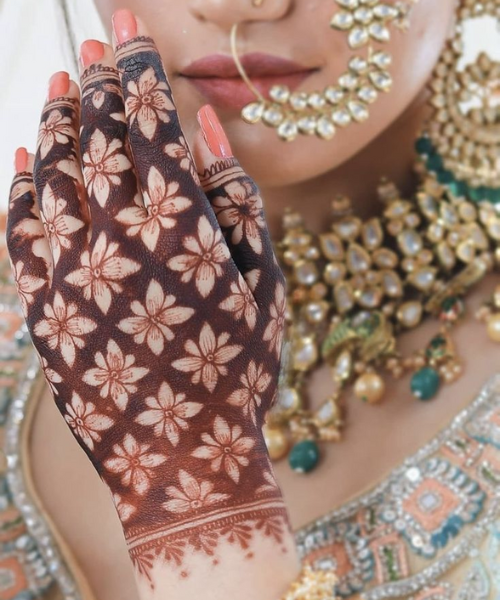 Back hand mehndi with flowers