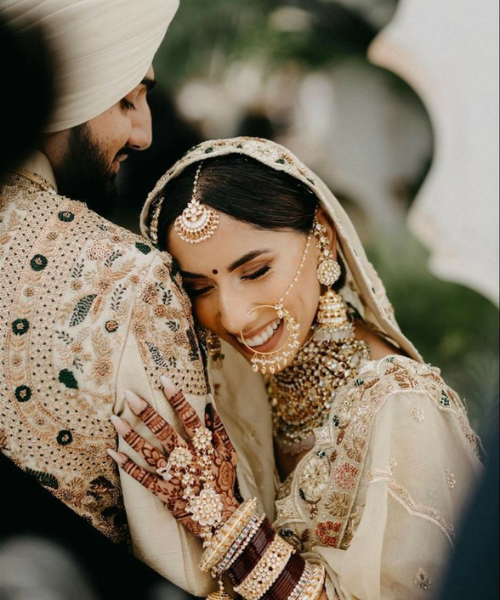 Bride leaning on groom's shoulder