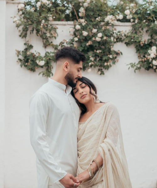 Bride rests gently on the groom's shoulder