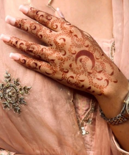 Elegant Half-Hand Bridal Mehndi with Swirls and Crescents