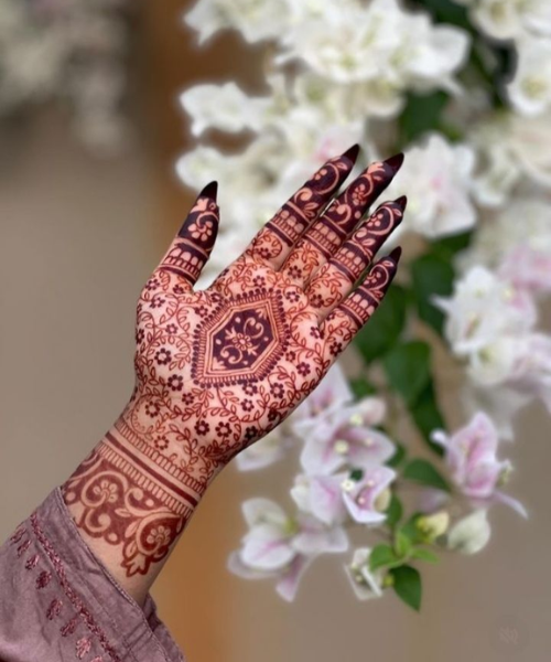 Intricate Bridal Palm Mehndi Design with Bold Details