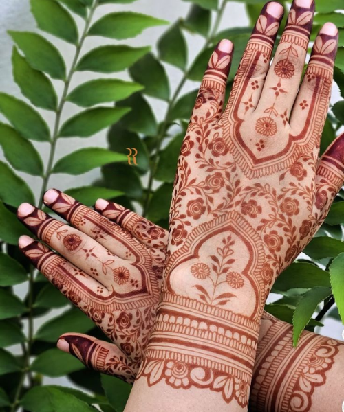 Back Hand mehndi with flower and leaves