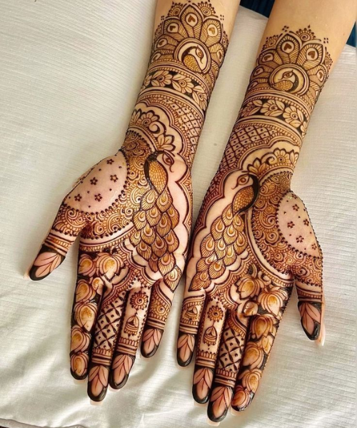 Mehndi design with peacock and lotus flower