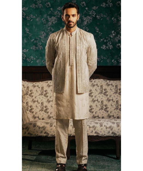 Beige sherwani with intricate zari detailing