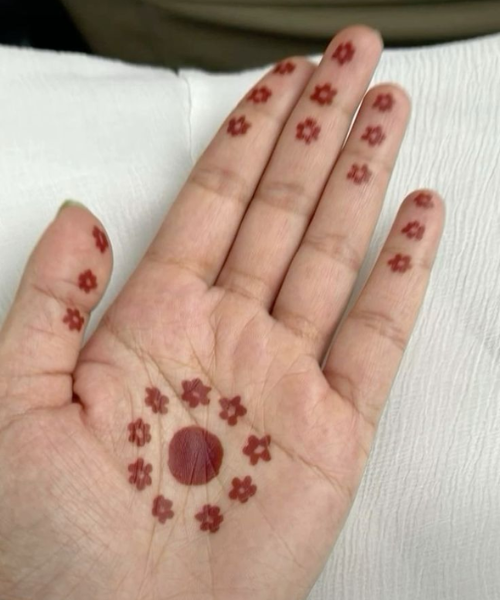 Bold Central Dot with Dainty Floral Accents