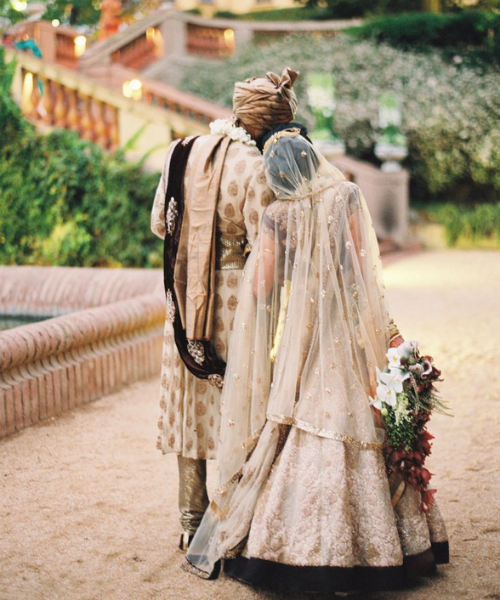 Back Pose with Bride Resting on Groom’s Shoulder