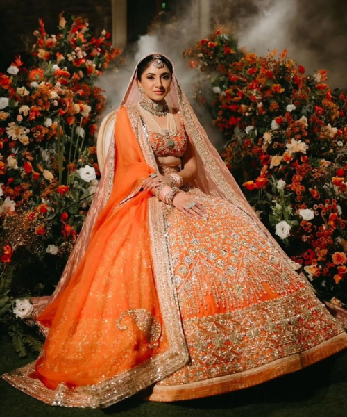 Bright Orange Net Lehenga with Golden Zari Work