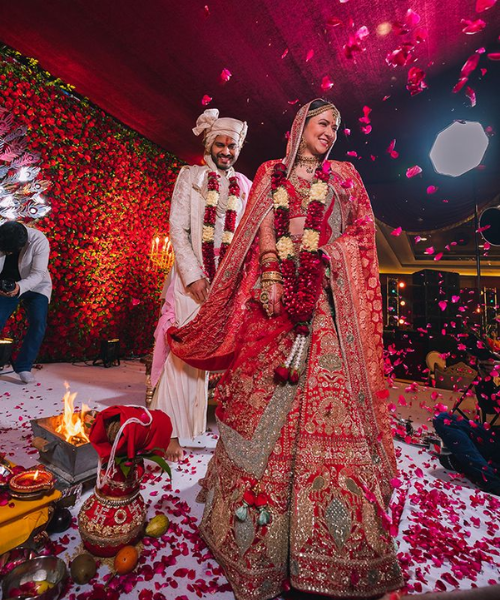 Candid Varmala Ceremony Pose with Petal Shower