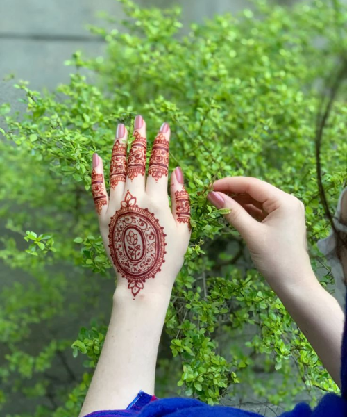 Oval Motif Mehndi with Floral Touch - Latest Mehndi Designs 2025 