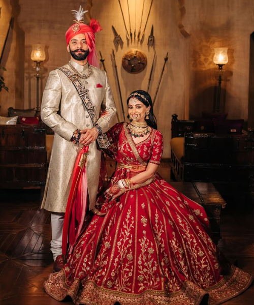 Royal Seated Bride and Standing Groom Pose