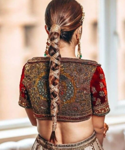 Sleek Braided Ponytail with Golden Wraps