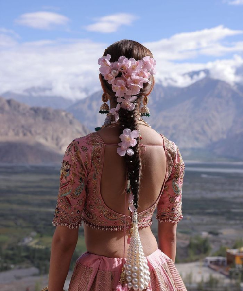 Floral Braided Bun with Open Back Look - Summer Hairstyles for Brides