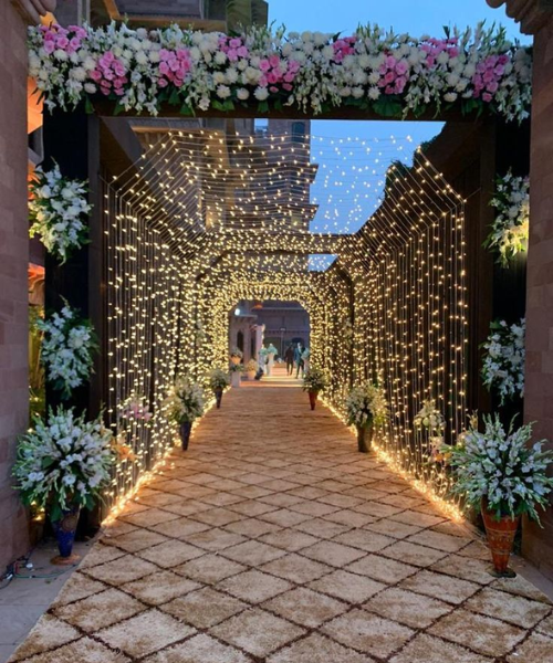 Fairy Light Tunnel with White Blooms